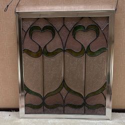 Two hanging stained glass