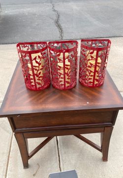 Three red candle sconce