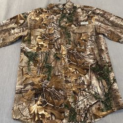 Magellan camouflage angler fit shirt. Size XS in good condition. 