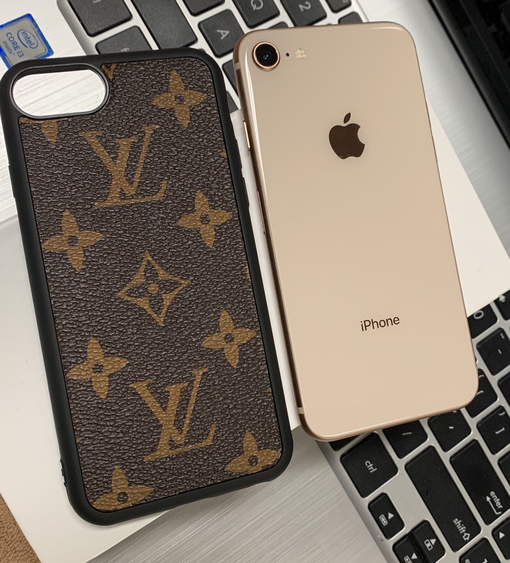 iPhone 8 with designer case and accessories