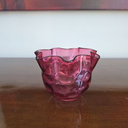 Cranberry glass ruffled bowl with inverted thumbprint pattern