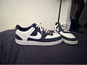 Navy Blue w/ White Dunks size 11 men.