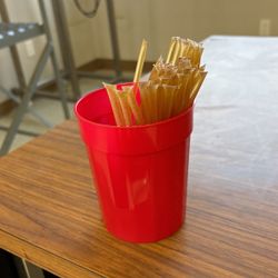 Cup Of Honey Sticks