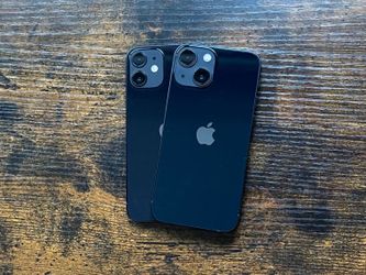 Two Apple iPhones 13 in Midnight Black