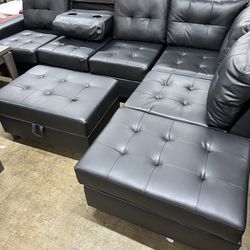 SECTIONAL SALE!  BRAND NEW 3pc. Black Sectional with Storage Ottoman & Fold-down Armrest & Cup Holders (Reg. $1,200).  New in boxes!  IN STOCK TODAY!