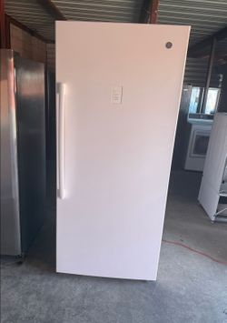 White GE Standing Freezer