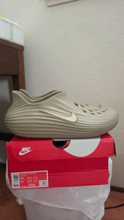 Nike  size. 10  Reactx rejuven8 khaki color