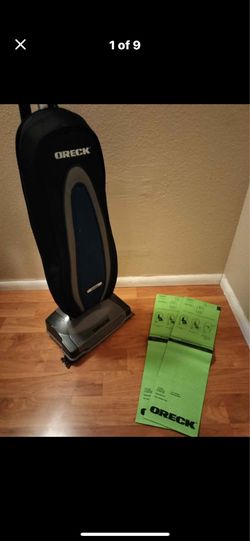 Oreck indigo upright Vacuum cleaner with 2 Bags and extra belt
