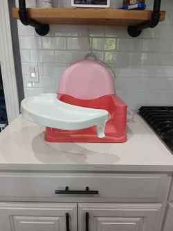 EASY CARE SWING TRAY BOOSTER SEAT
