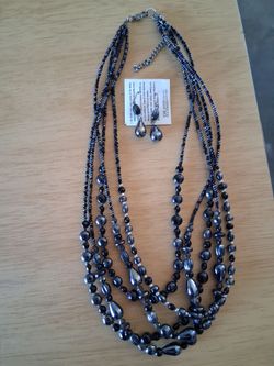 Avon jewelry.  Earrings with matching necklace.