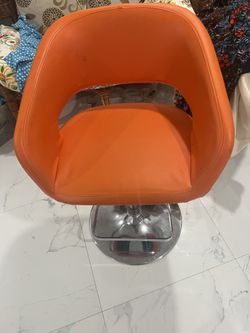 Two Leather Orange Bar Chairs 