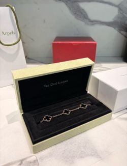 Gold and black bracelet