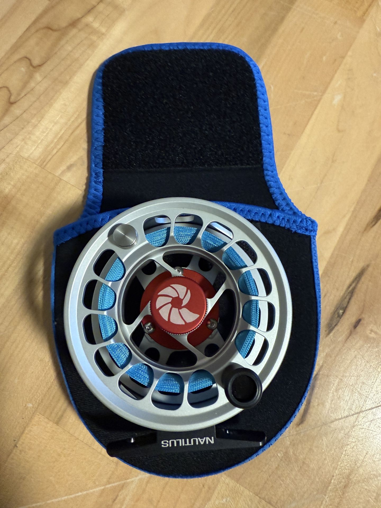 NEW UNUSED NAUTILUS XM FLY FISHING REEL (SILVER)