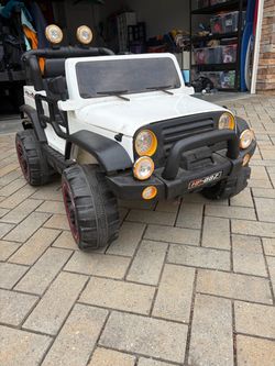 Kids Jeep power wheels with remote
