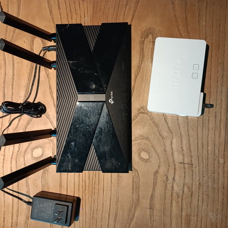 TP-link ArcherAX1300 & Netgear Dual Band Wifi Extender