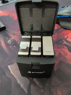 GoPro Hero 12 charger and 3 batteries