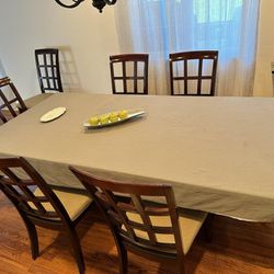 Solid Wood Dining Table W Expansion Leaves & 7 Chairs