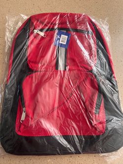 Brand new red and black medium backpack