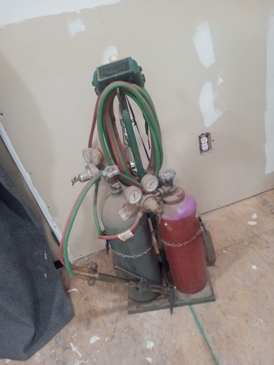 Gas Welder And Cutting Torch Have Other Tip For welding Tanks Full Work Great. Also Have Dolly Used Once After Filling Obo