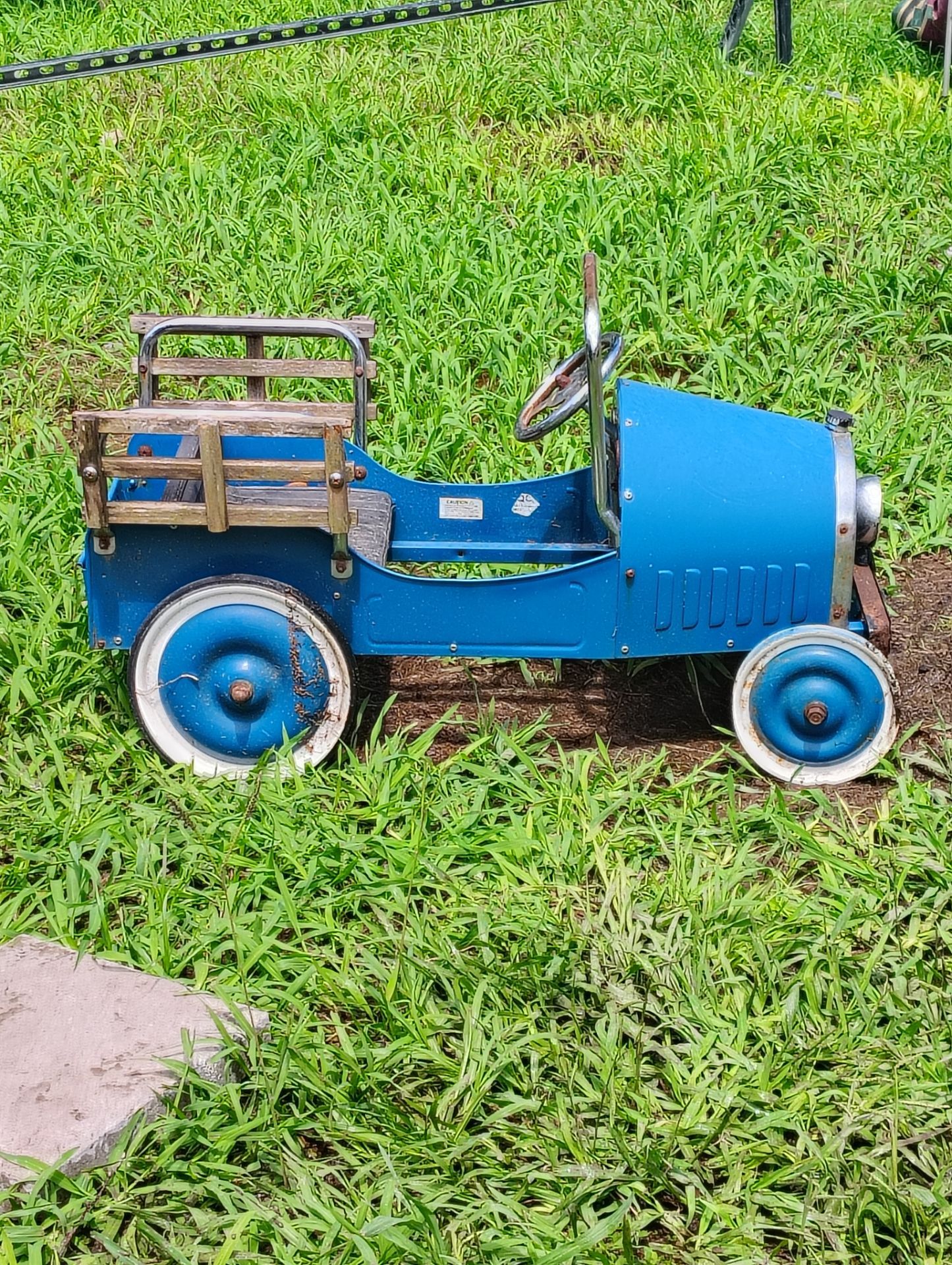 Antique paddle kid car