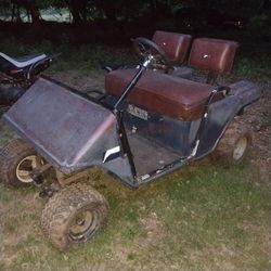 Lifted Golf cart  older