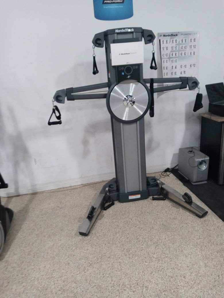 NordicTrack functional trainer for a home gym we also have exercised bike elliptical and treadmill