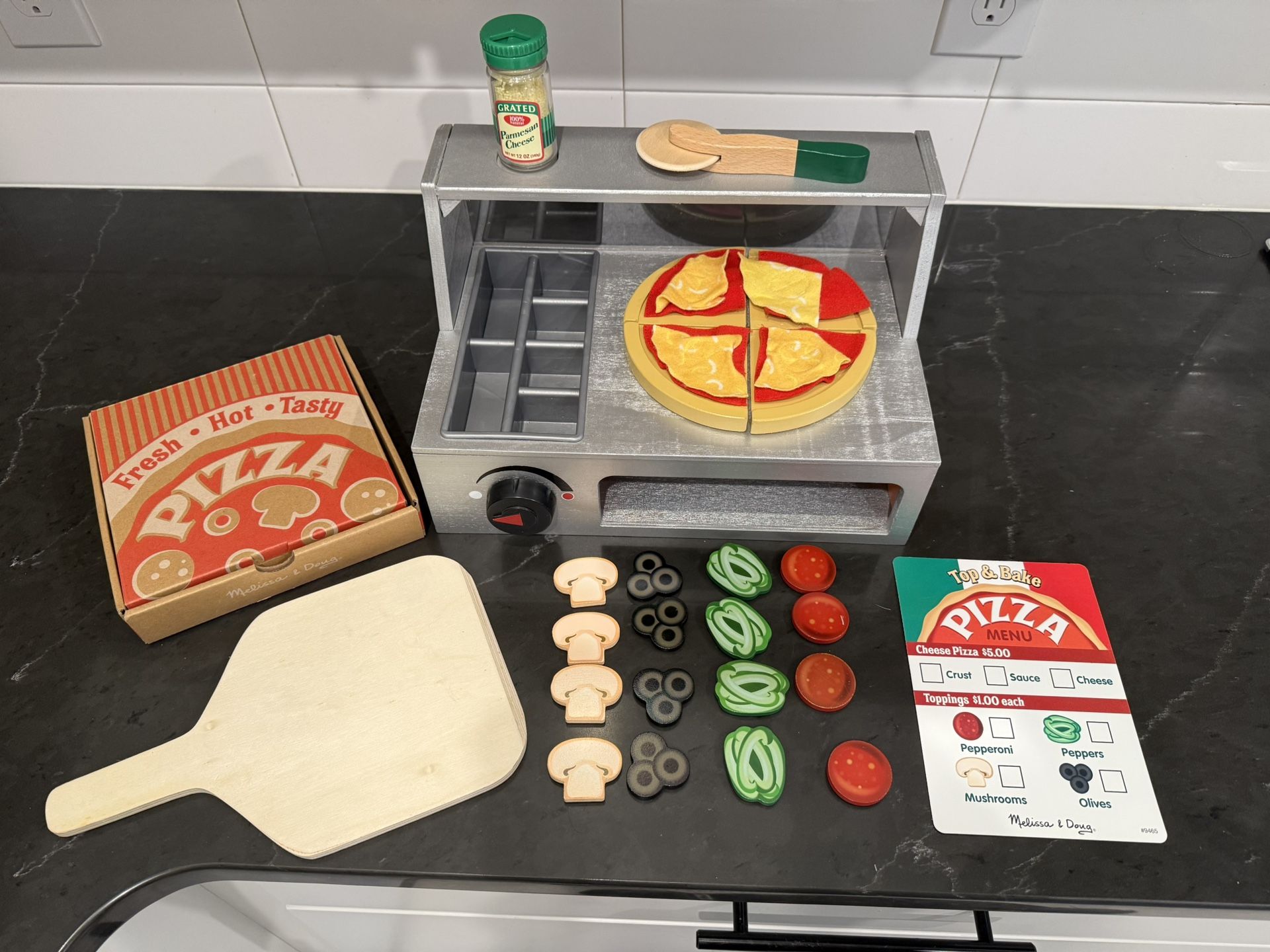 Melissa & Doug Top & Bake Wooden Pizza Counter Play Set.