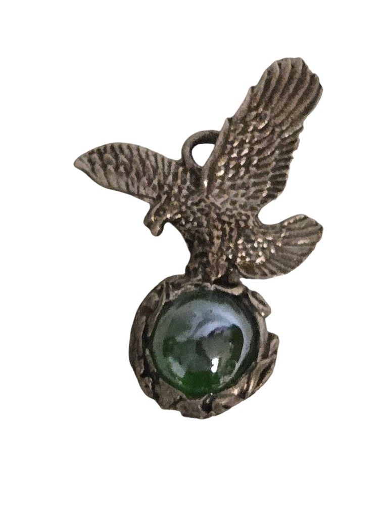 eagle cast iron pendant clasping green glass orb