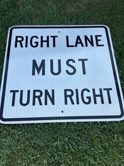 Right Lane Must Turn Right Road Sign