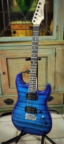 Brand new electric guitar with new bag cable and shoulder strap