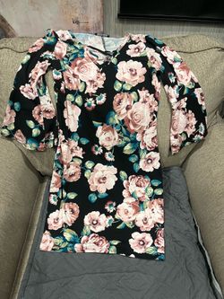 A dress pink flowers black background