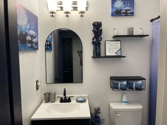 2 Thomas Lighting bathroom fixtures