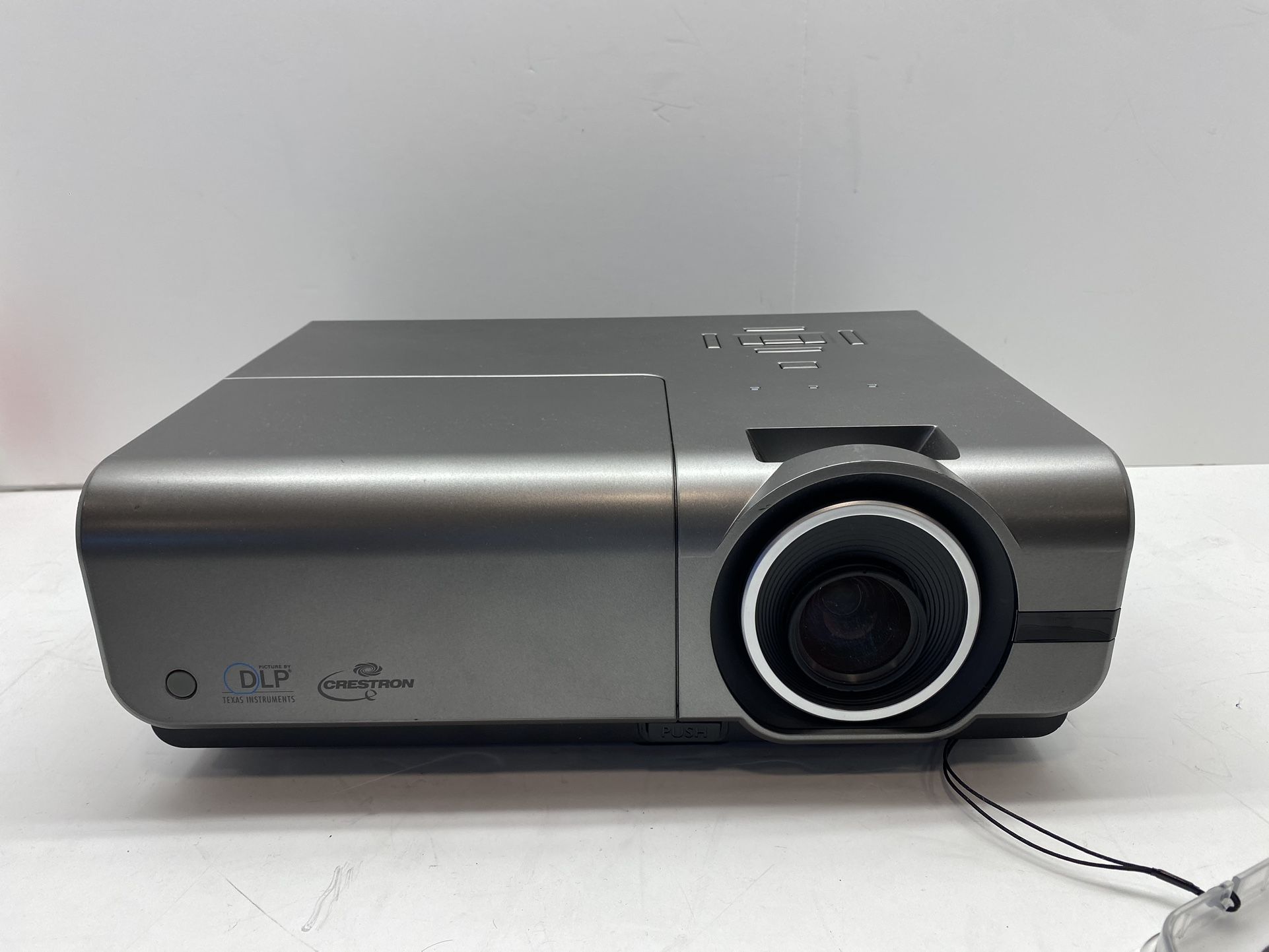 Optoma TH1060P, 1080p high-definition DLP projector, delivers clear widescreen images with BrilliantColor technology ensures every image