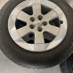 4 Toyota rims with like new tires For Corolla or Prius