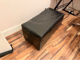 Black leather ottoman with storage!