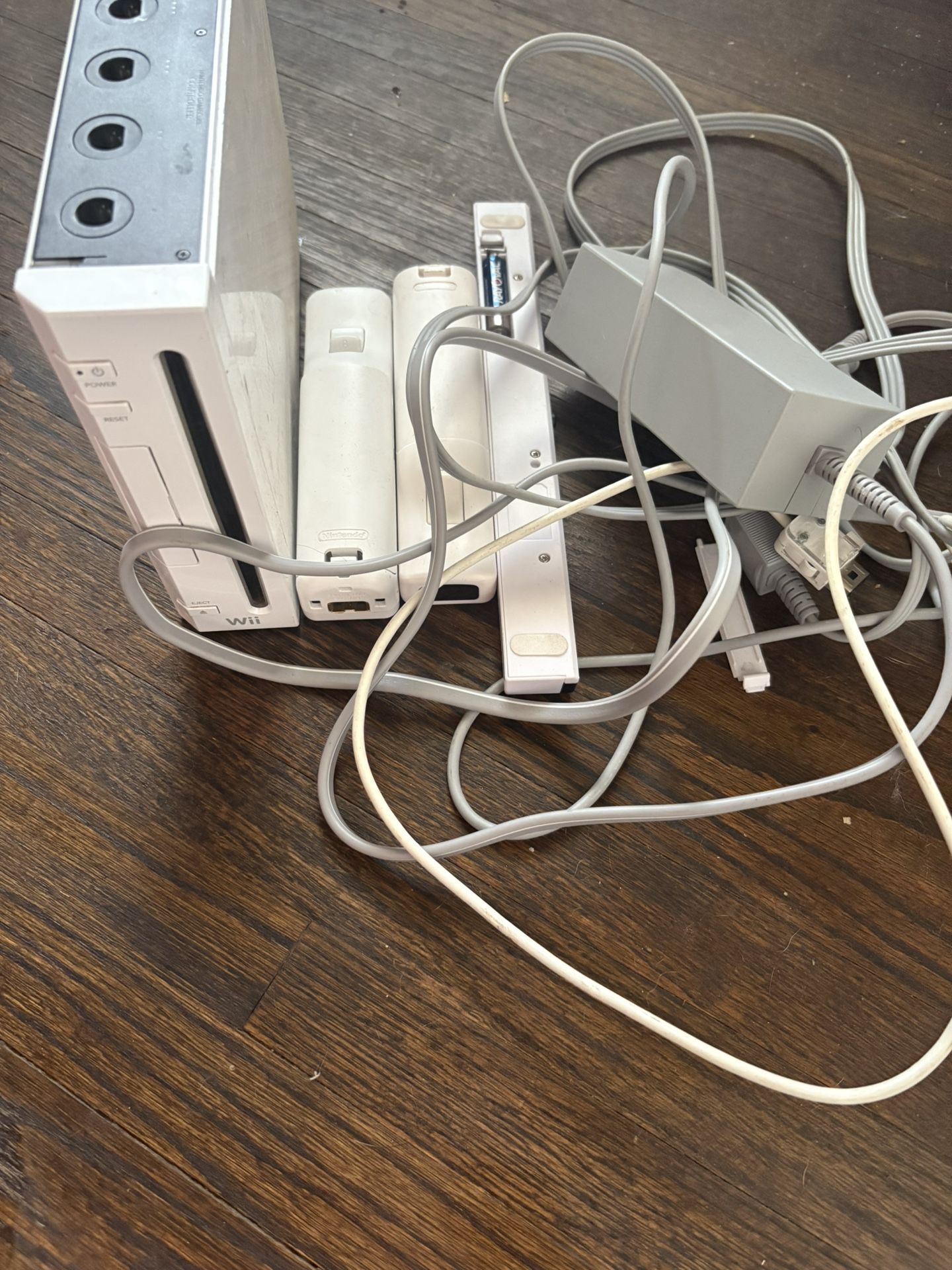 Wii console with two controllers