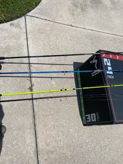 (2) 7 feet reel and rods, black and blue  (1) Yellow (6) foot reel and rod (1) reel and rod (2) pole holders and a 6 foot shrimp net