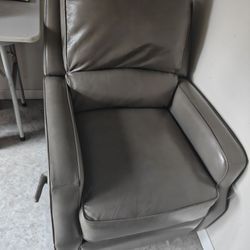 2 Grey Rocking Recliners
