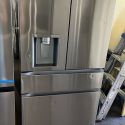 LG FOUR DOOR REFRIGERATOR STAINLESS STEEL 