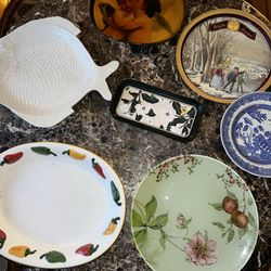 Lot of various food serving trays servers platters
