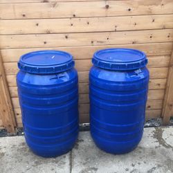 Two Blue Barrels 50gallons 