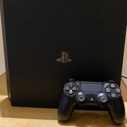 PlayStation 4 PRO  (with games and controller)