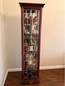 Howard Miller Narrow / Tower Curio Cabinet