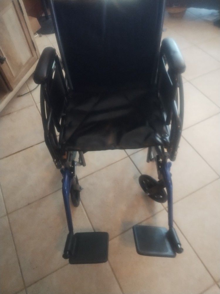 Wheelchair With Leg Rest