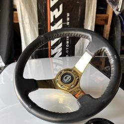 NRG gold steering wheel 