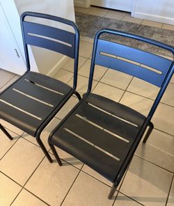 2 metal chairs
