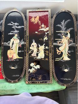 vintage Chinese black lacquer wall panels featuring intricate polychrome mother of pearl inlay