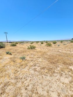 LAND 2.49 ACRE LAND RIDGECREST CA CHINA LAKE KERN COUNTY FOR RESIDENTIAL O MOBILE HOME,OR RV CAN LIVE FLAT LAND POWER ELECTRIC FOR SALE BY OWNER SERIO