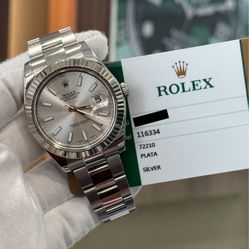 116334 Silver index oyster 10 links preowned watch and card $10,300 plus shipping 