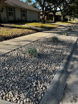 Free 2” River Rock landscaping rock.